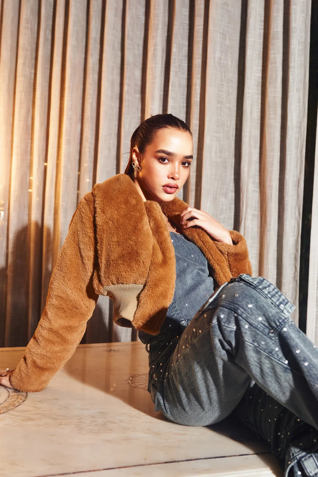 em tan jacket, image 2