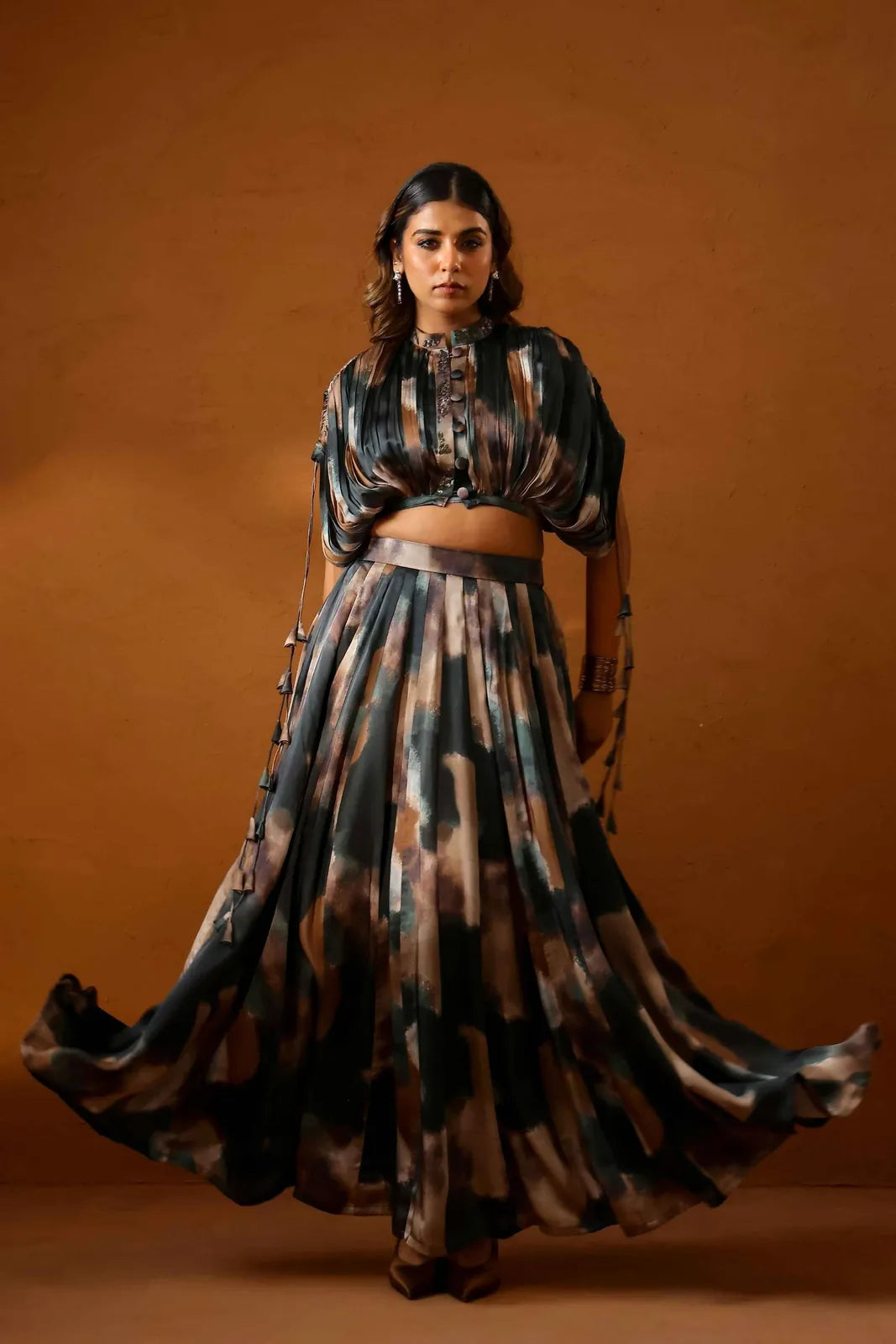 heena somani in patina skirt paired with bustier and jacket, image 1
