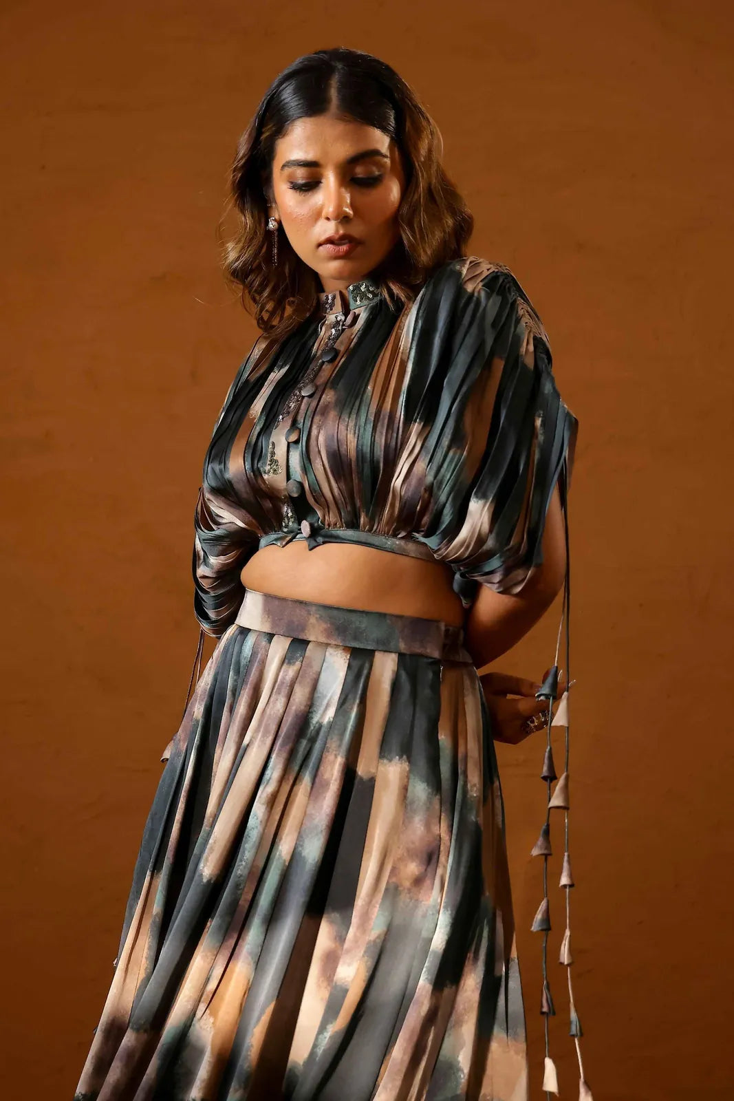heena somani in patina skirt paired with bustier and jacket, image 4