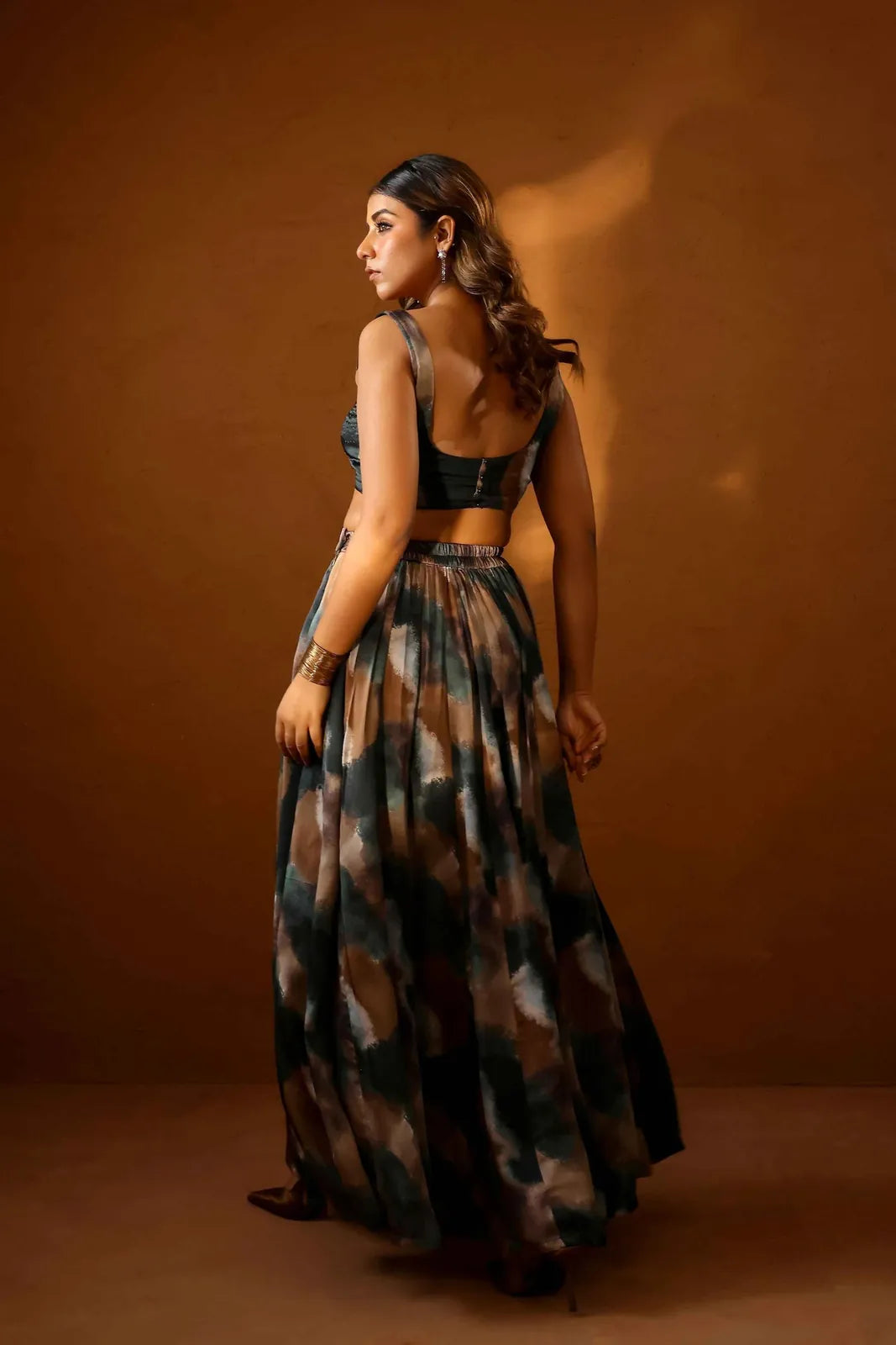 heena somani in patina skirt paired with bustier and jacket, image 8